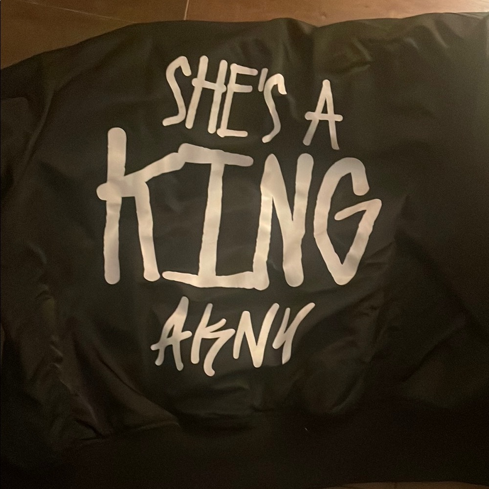 Black Jacket with White Graphic Text